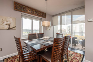 dining area with floor to ceiling windows. view of river. Philadelphia real estate