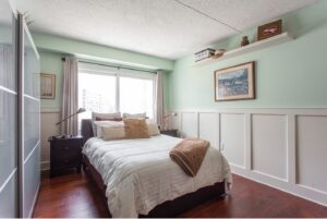 bedroom with wainscotting window - philadelphia real estate with views and balcony