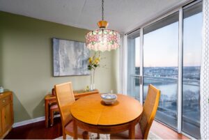 apartment dining room floor to ceiling windows with view